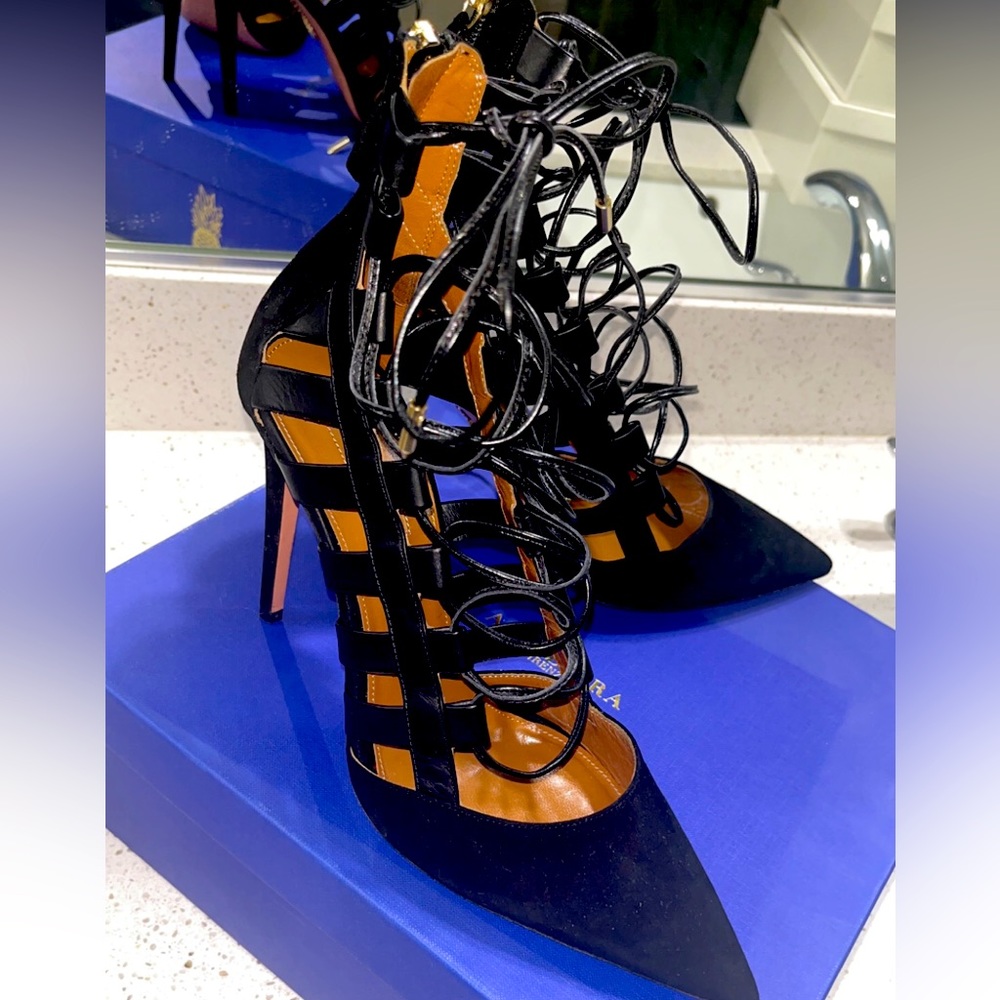 Black lace up heel. Worn once. Black